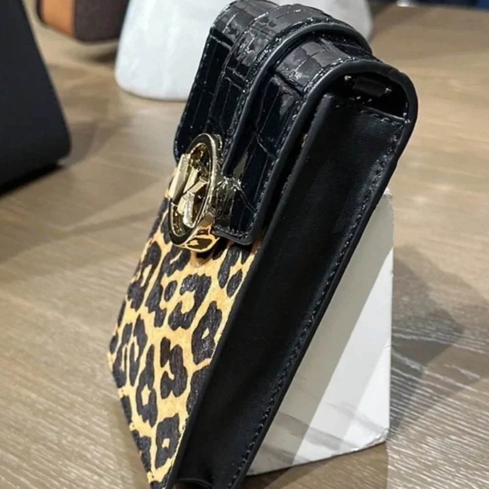 Brand New with Tag
Michael Kors Carmen Small NS Phone XBODY HairCalf
Black Multi - Picture 14 of 16